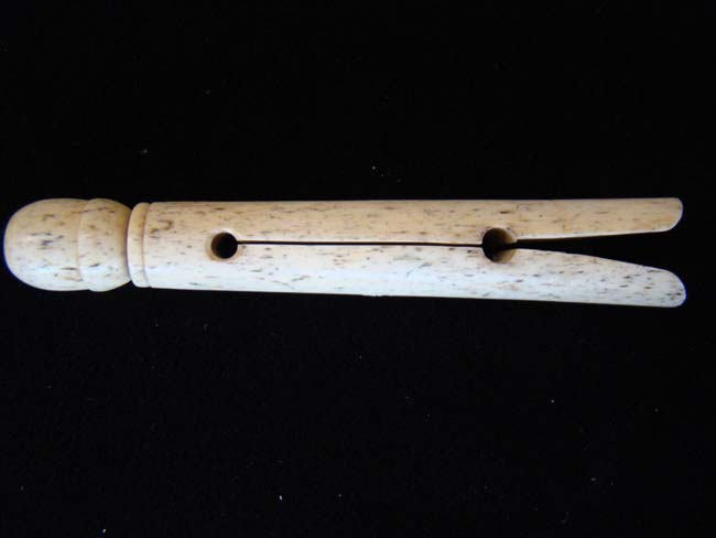 A nice 19th century Whalebone Clothes Pin with acorn finial